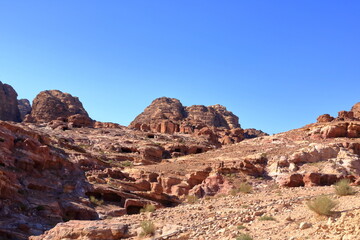 Fototapeta premium footpath in the rock along Ad-Deir Trail Monastery Route in the historic and archaeological city of Petra, Jordan