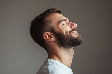 Fototapeta premium A close up of a man's face with her eyes closed