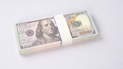 US dollars banknotes isolsted on white background.