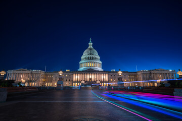Wide angle View of the US Capitol At night with light trails