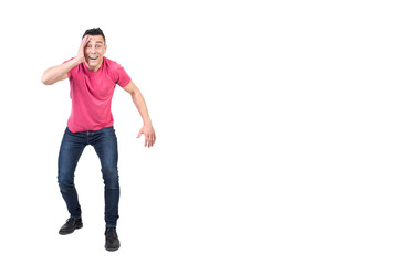 Astonished man touching face in studio. White background