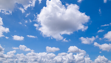 clear blue sky background,clouds with background, Blue sky background with tiny clouds. White fluffy clouds in the blue sky. 