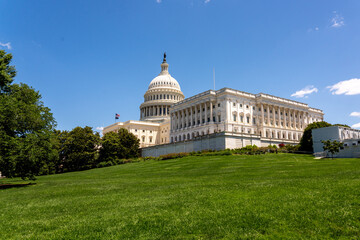 East Side of the US Congress Building with Blue Skies and Green Lawn