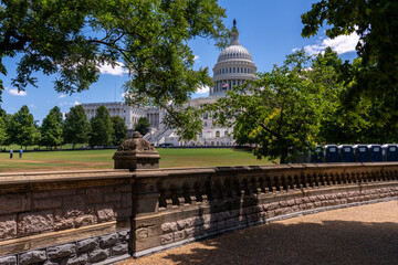 Side View of the US Congres With Blue Skies and US Flag Flying High