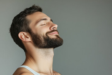 Obraz premium A close up of a man's face with her eyes closed