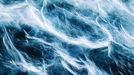 Obraz premium Waves breaking against the shore at sunset with blue and white foamy patterns