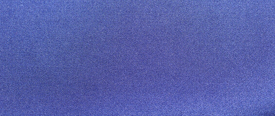 Bright blue fabric texture. Blue fabric background. Close-up of blue cloth. 