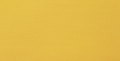 Yellow fabric texture. Yellow fabric background. Close-up of yellow cloth. 