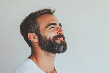 Obraz premium A close up of a man's face with her eyes closed