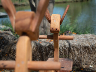 toy horse playing focus animal pet riding children pony copy space leisure activity antique costume imagination playing son girl kid boy learning education insurance family carnival back to school