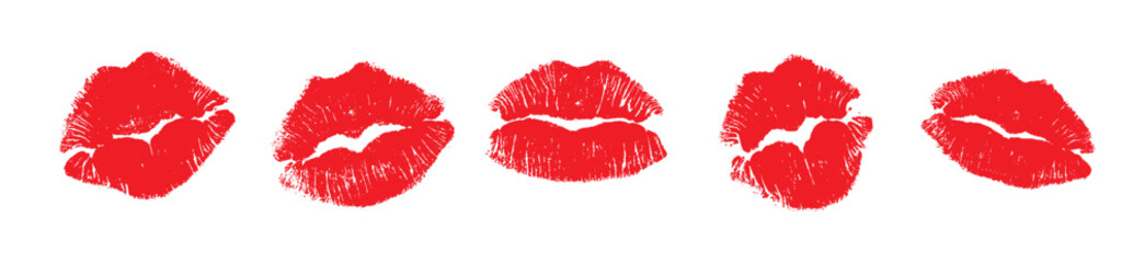 The lip prints of different women around the word kiss on a white background.