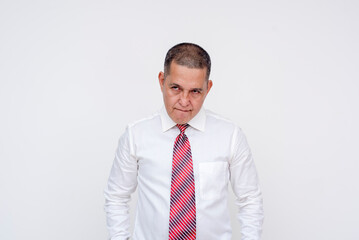 A middle aged asian boss or manager seething after disappointing sales and incompetent employees. Isolated on a white background.