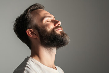 Fototapeta premium A close up of a man's face with her eyes closed