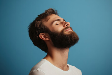 Obraz premium A close up of a man's face with her eyes closed