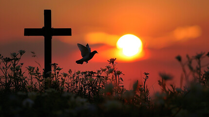 Silhouette of a Cross and Dove at Sunset