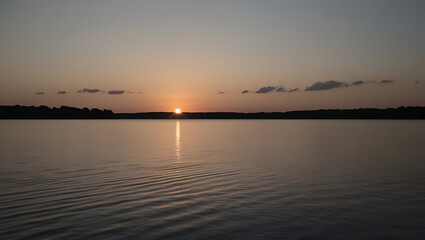 Evening Tranquility: The Beauty of a Quiet Lake at Sunset