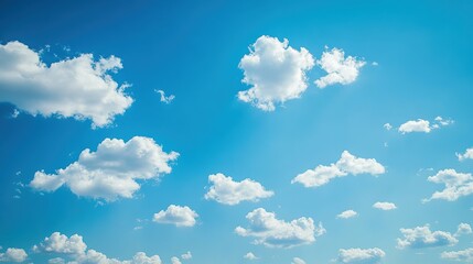 Serene Blue Sky with Scattered Clouds Offering Tranquility and Peaceful Atmosphere