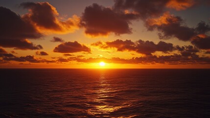 Majestic Orange Sunset: Dramatic Sky Over Ocean Waves