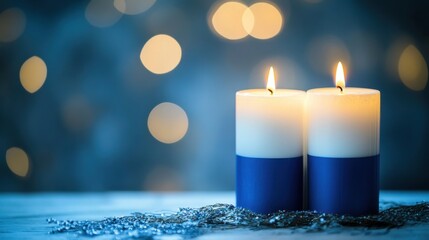 Independence day of Finland celebration. Burning candles in the colors of the Finland flag. Horizontal banner. Copy space. Holiday poster, card. Blue and white candles, blue background, bokeh effect