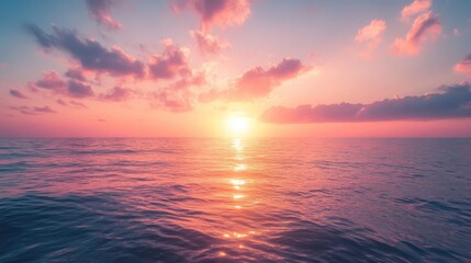 Sunset over the ocean with Peach Fuzz hues warm colors blend with the water creating a serene and captivating scene perfect for landscape photography