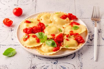 Ravioli with tomato sauce and basil