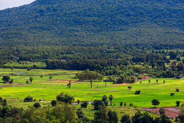 Obraz premium Natural background, high angle view from the observation point, blurred golden rays of the sun visible. The mountains that were setting on the horizon, changed beautifully with the wind.