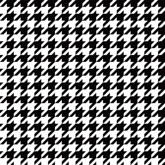 A black and white houndstooth check pattern background illustration. Named for its shape resembling a hunting dog's teeth. A classic, retro, vintage style pattern.