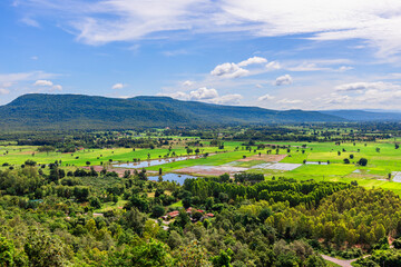 Natural background, high angle view from the observation point, blurred golden rays of the sun visible. The mountains that were setting on the horizon, changed beautifully with the wind.