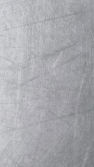 The steel plate surface has scratches from use.