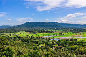 Natural background, high angle view from the observation point, blurred golden rays of the sun visible. The mountains that were setting on the horizon, changed beautifully with the wind.