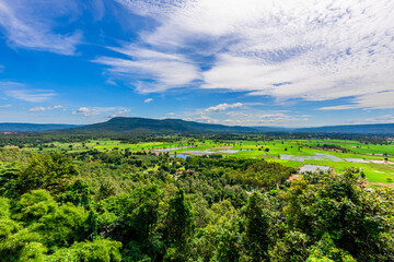 Natural background, high angle view from the observation point, blurred golden rays of the sun visible. The mountains that were setting on the horizon, changed beautifully with the wind.