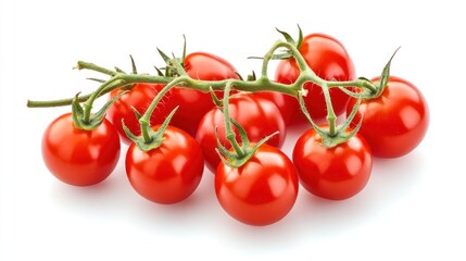 A bunch of ripe, red cherry tomatoes attached to a green vine, isolated on a white background, displaying freshness and ready for culinary use.