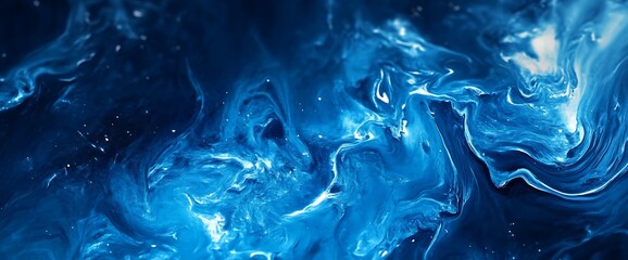 Abstract blue and white swirling paint.