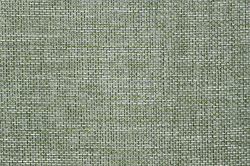 Close up of almond green burlap fabric jute fabric for pattern background