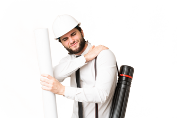 Young architect man with helmet and holding blueprints over isolated chroma key background suffering from pain in shoulder for having made an effort
