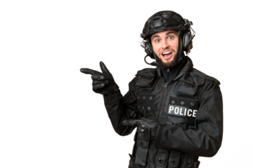 SWAT over isolated chroma key background surprised and pointing side