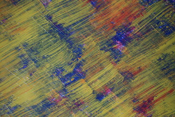 Fototapeta premium Mixed yellow acrylic paint splatter on top of a blue paint surface, Multicolor paint splash textured backdrop, Vintage mixed color pattern strokes background
