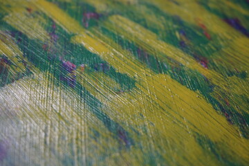 Fototapeta premium Mixed yellow acrylic paint splatter on top of a blue paint surface, Multicolor paint splash textured backdrop, Vintage mixed color pattern strokes background