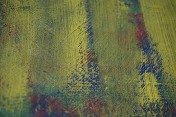 Multicolor yellowish paint brush splatter background, Abstract colorful paint splatter surface, Grungy paint brush yellow splash on a dark surface