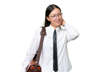 Young Asian business woman over isolated background thinking an idea