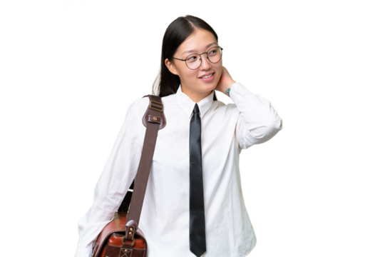 Young Asian business woman over isolated background thinking an idea