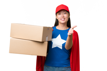 Super Hero delivery Asian woman holding boxes over isolated background shaking hands for closing a good deal