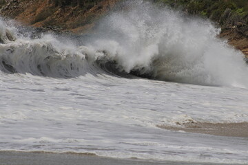 wave breaking on the beach
