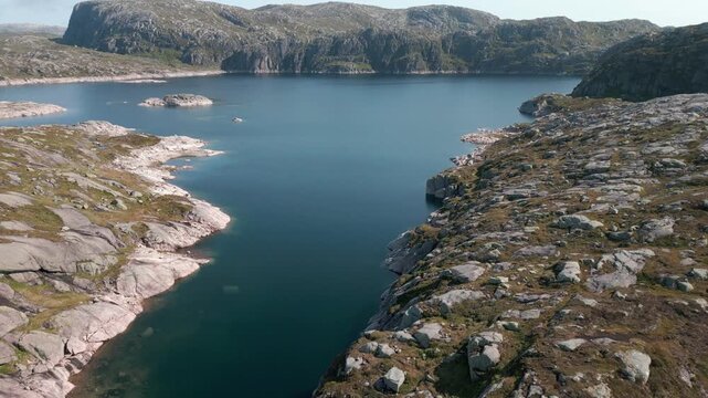 Beautiful nature with rock mounds on sunny day is summer close to Lysebotn town in Norway