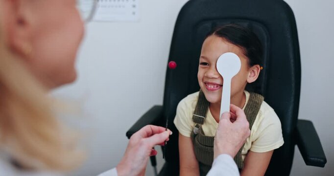 Eye exam, patient and optometrist cover child vision for optical service, ocular support and test youth retinal focus on pin. Clinic, optometry equipment and check young kid client for strabismus