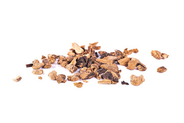 Obraz premium great yellow gentian dried root pile isolated on white background. bitter for apéritifs, liqueurs, and tonics. herbal medicine 
