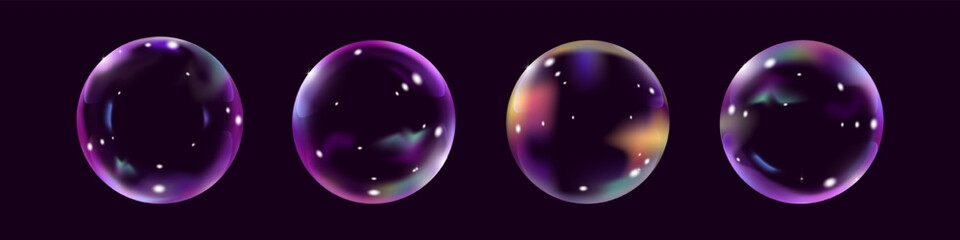 Collection of realistic soap bubbles with multicolored blurring on a dark purple background.