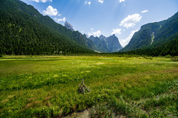 Obraz premium A view with a meadow in front to Ebenkofel