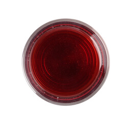 Tasty grape juice in glass isolated on white, top view