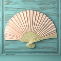 Elegant pastel-colored folding fan displayed on a textured teal wall, showcasing intricate design and cultural aesthetic in home decor